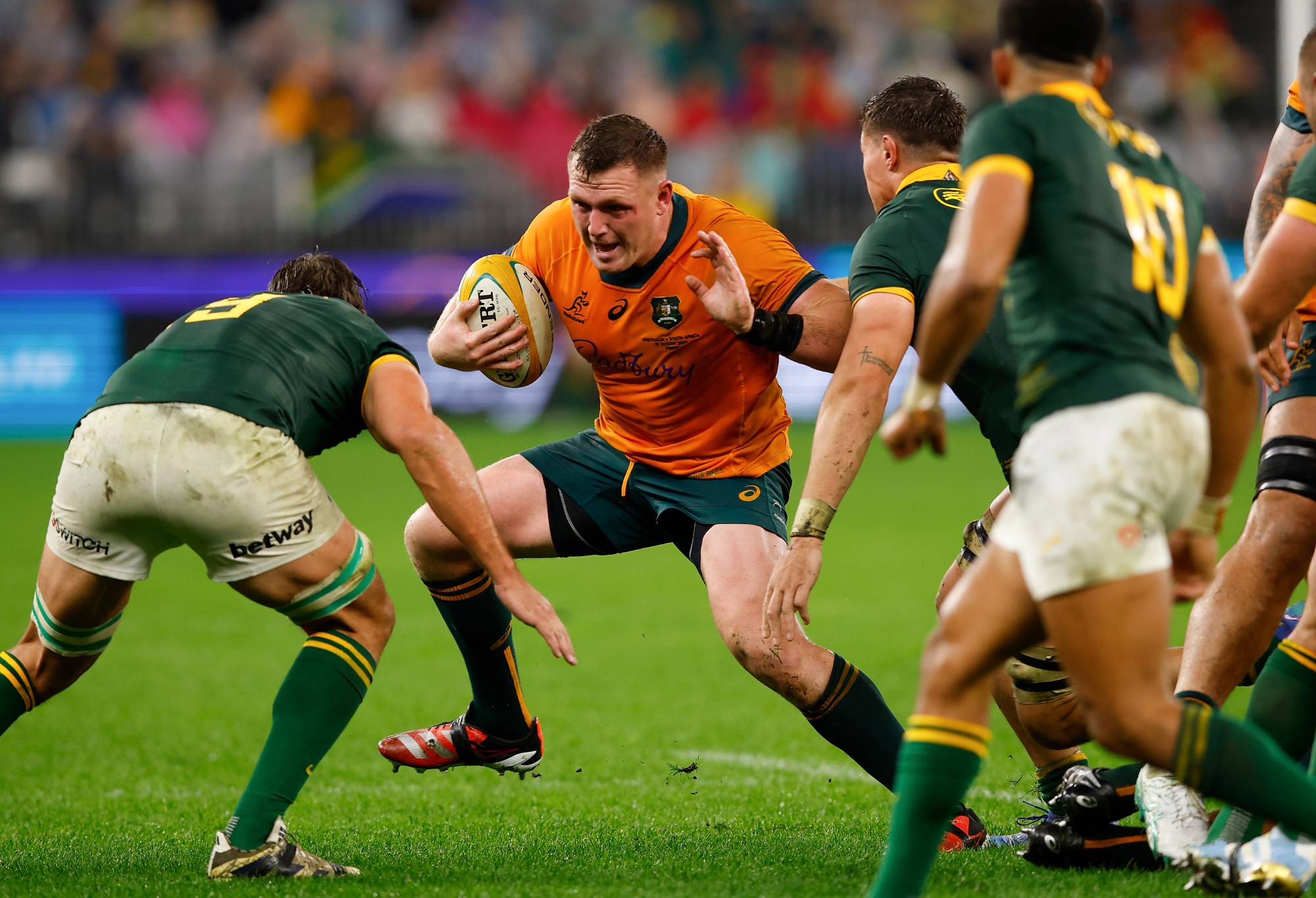 Angus Bell of the Wallabies looks to make his way through the defenders during The Rugby Championship match between Australia Wallabies and South Africa Springboks at Optus Stadium on August 17, 2024 in Perth, Australia. (Photo by James Worsfold/Getty Images)