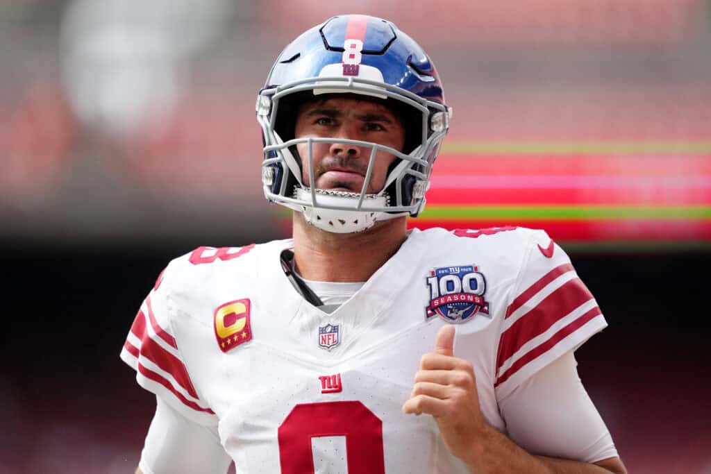 CLEVELAND, OHIO - SEPTEMBER 22: Quarterback Daniel Jones #8 of the New York Giants looks on before the game against the Cleveland Browns at Cleveland Browns Stadium on September 22, 2024 in Cleveland, Ohio.