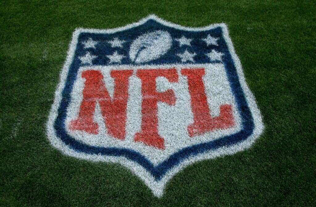 DENVER - SEPTEMBER 20: A detail of the NFL logo on painted on the sideline grass as the Cleveland Browns face the Denver Broncos during NFL action at Invesco Field at Mile High on September 20, 2009 in Denver, Colorado. The Broncos defeated the Browns 27-6.