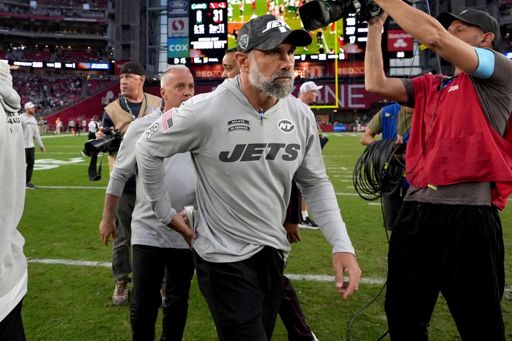 Jets interim head coach Jeff Ulbrich leaves the field after Sunday's lossagainst the Cardinals in Glendale, Ariz. 