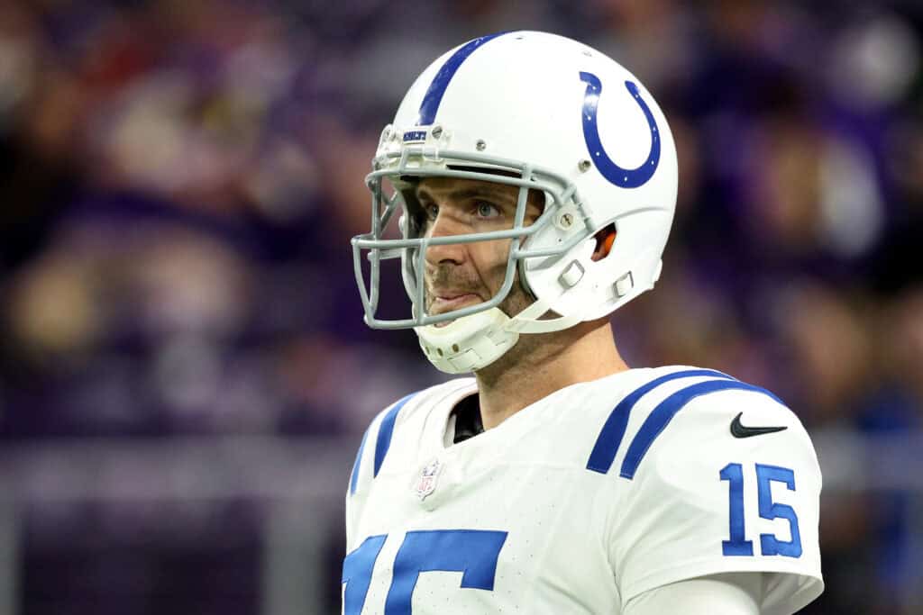 MINNEAPOLIS, MINNESOTA - NOVEMBER 03: Joe Flacco #15 of the Indianapolis Colts looks on during warm ups prior to the game against the Minnesota Vikings at U.S. Bank Stadium on November 03, 2024 in Minneapolis, Minnesota.