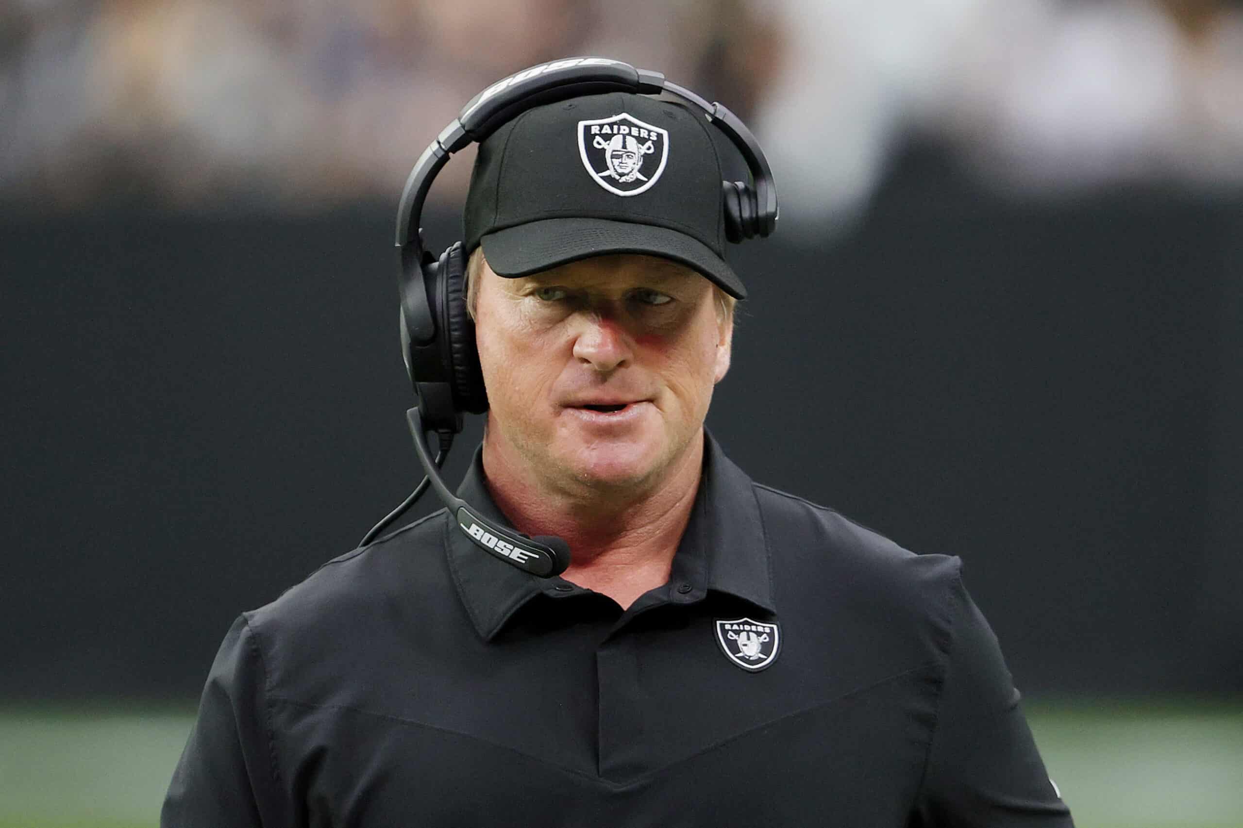 LAS VEGAS, NEVADA - OCTOBER 10: Head coach John Gruden of the Las Vegas Raiders reacts on the sideline during a game against the Chicago Bears at Allegiant Stadium on October 10, 2021 in Las Vegas, Nevada.