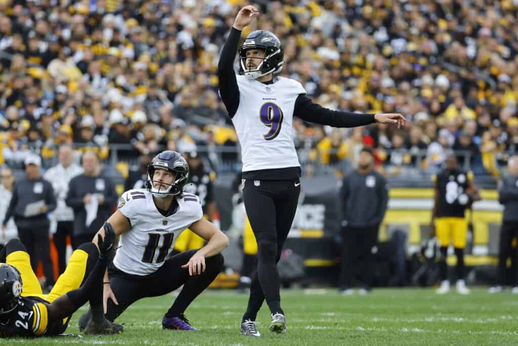 PITTSBURGH, PENNSYLVANIA - NOVEMBER 17: Justin Tucker #9 of the Baltimore Ravens reacts after an extra point in the second quarter of a game against the Pittsburgh Steelers at Acrisure Stadium on November 17, 2024 in Pittsburgh, Pennsylvania.