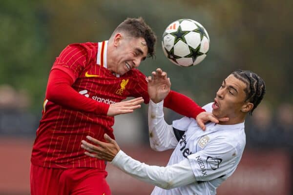 KIRKBY, ENGLAND - Tuesday, November 5, 2024: Liverpool's Josh Davidson (L) challenges for a header with Bayer Leverkusen's Montrell Culbreath during the UEFA Youth League game between Liverpool FC Under-19's and Bayer Leverkusen Under-19's at the Liverpool Academy. (Photo by David Rawcliffe/Propaganda)