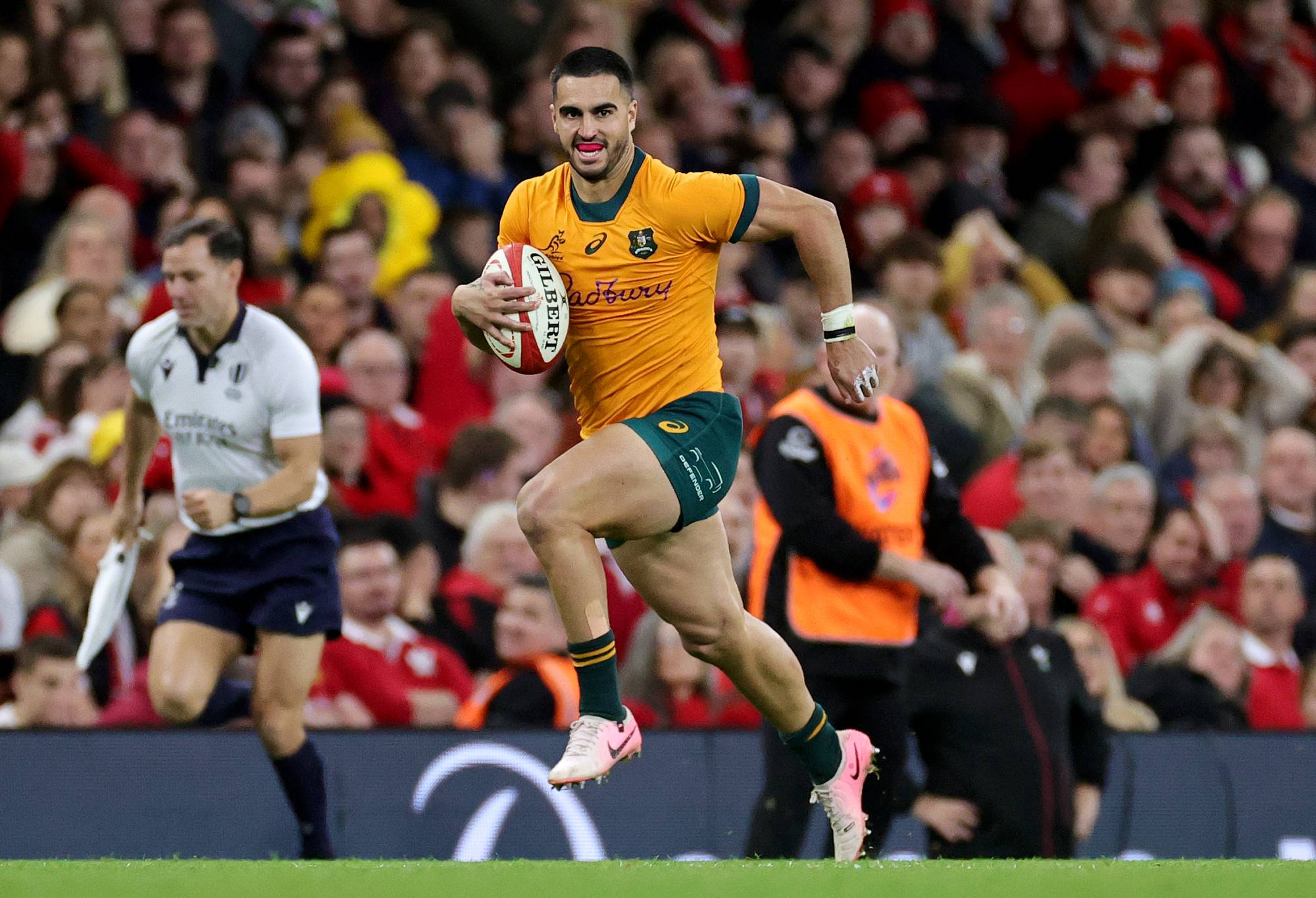 Tom Wright of Australia breaks through the Wales defence as he runs in to score his team's sixth try during the Autumn Nations Series 2024 match between Wales and Australia at the Principality Stadium on November 17, 2024 in Cardiff, Wales. (Photo by David Rogers/Getty Images)