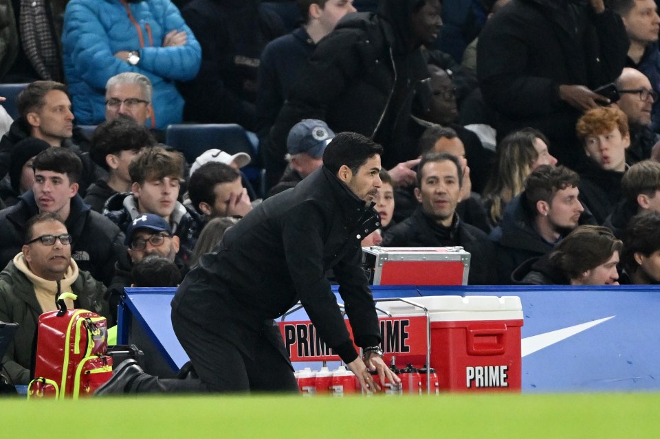 Arsenal manager Mikel Arteta fell to the ground as he watched his side lose more ground in the Premier League title race