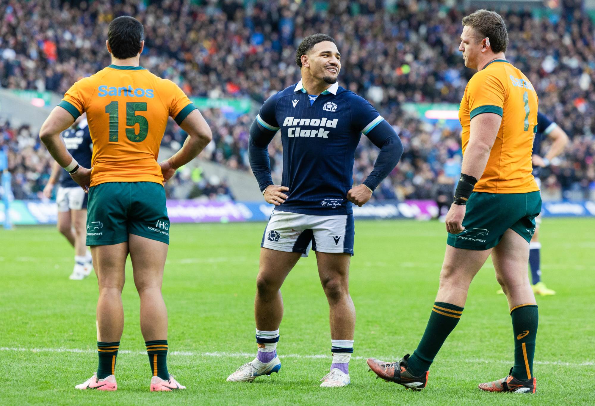 Scotland's Sione Tuipulotu speaks to Australia's Angus Bell during The Famous Grouse Nations Series match between Scotland and Australia at the Scottish Gas Murrayfield Stadium on November 24, 2024, in Edinburgh, Scotland. (Photo by Ross Parker/SNS Group via Getty Images)