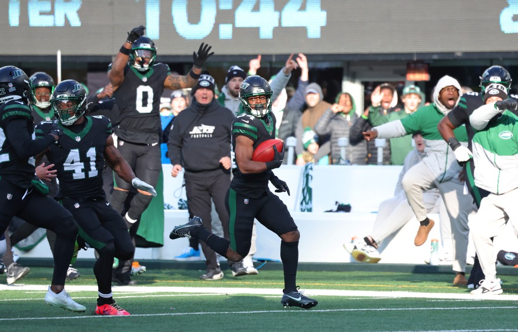 Kene Nwangwu #34 of the New York Jets runs with the ball during the first half when the New York Jets played the Seattle Seahawks Sunday, December 1, 2024.