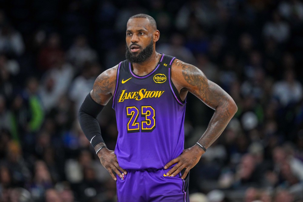 Dec 2, 2024; Minneapolis, Minnesota, USA; Los Angeles Lakers forward LeBron James (23) against the Minnesota Timberwolves in the first quarter at Target Center. Mandatory Credit: