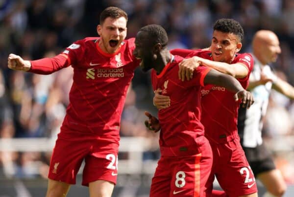 2J6BM3T Liverpool's Naby Keita (centre) celebrates scoring their side's first goal of the game with team-mates Andrew Robertson (left) and Luis Diaz (right) during the Premier League match at St. James' Park, Newcastle upon Tyne. Picture date: Saturday April 30, 2022.