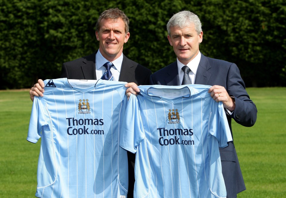 Garry Cook, left, with former Man City manager Mark Hughes, right in 2008