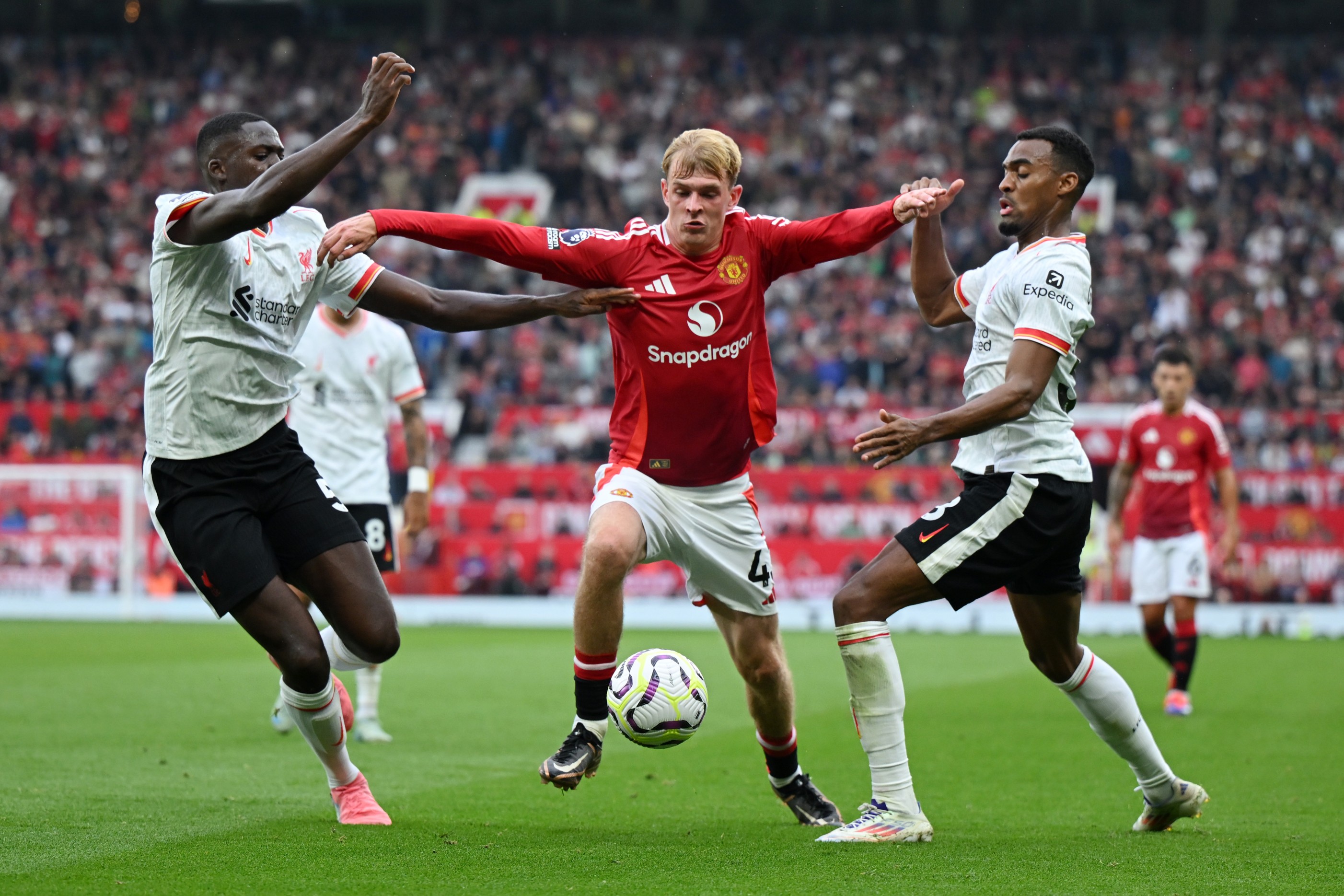 Toby Collyer of Manchester United in action against Liverpool