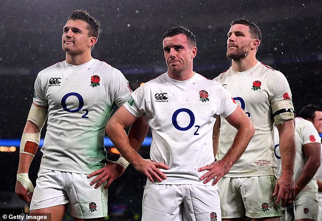 Henry Slade, George Ford and Mark Wilson (left to right) cut dejected figures after England's agonising 16-15 defeat against New Zealand at Twickenham during the challenging year