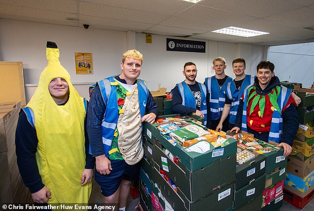 Oscar Lennon, Jimmy Halliwell, Richard Lane, Toby Fricker, Noah Heward and Sam Worsley lent their support at a food bank located next to Ashton Gate