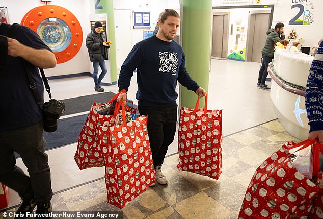 Harry Thacker for Bristol players to buy and hand out gifts at the Royal Hospital for Children