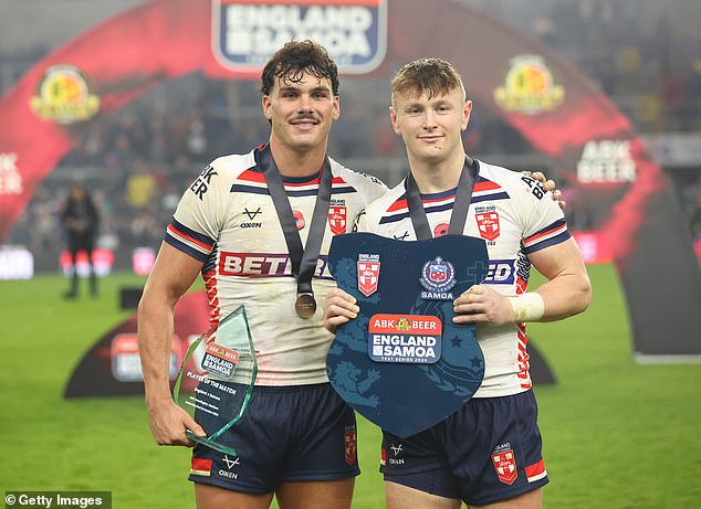 Nsemba made his first appearance for England in their second Test against Samoa at Headingley last month (pictured: England's Herbie Farnworth and Harry Newman with the trophy afterwards)