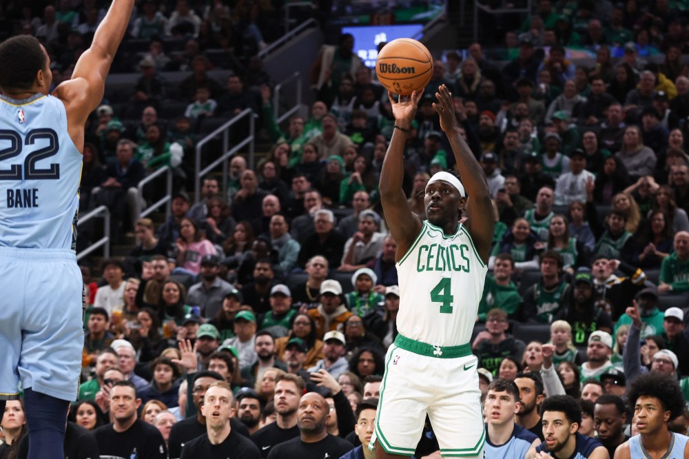 Dec 7, 2024; Boston, Massachusetts, USA; Boston Celtics guard Jrue Holiday (4) shoots during the first half against the Memphis Grizzlies at TD Garden. Mandatory Credit: