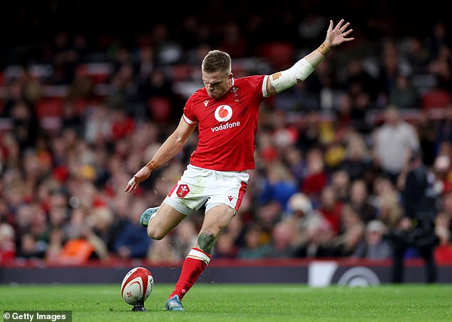 Aaron Wainwright sniped over from close range as Wales fought back initially