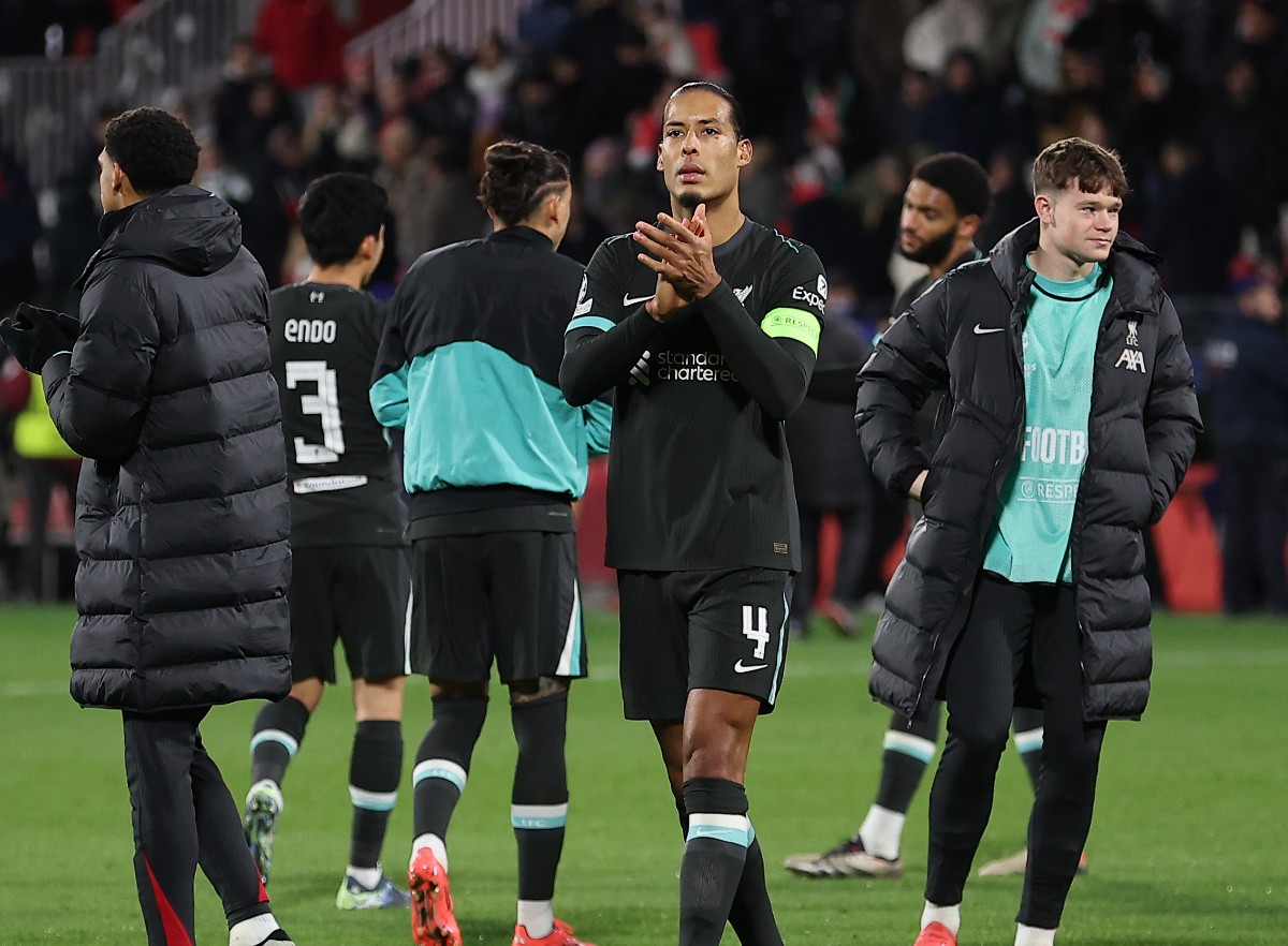 Virgil van Dijk applauds Liverpool's fans after the win in Girona