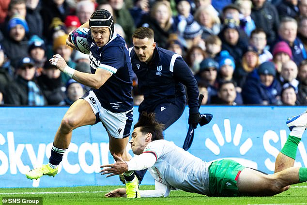 Darcy Graham skips past a Portuguese defender as the wing-back enjoys a field day