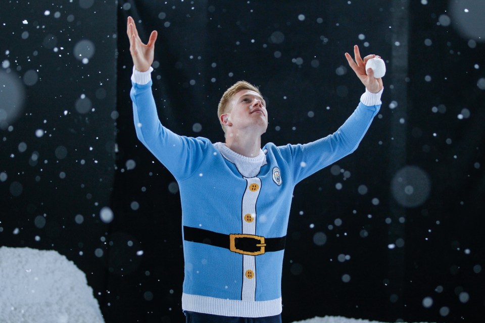 Kevin De Bruyne gets in the Christmas spirit by posing in a festive jumper