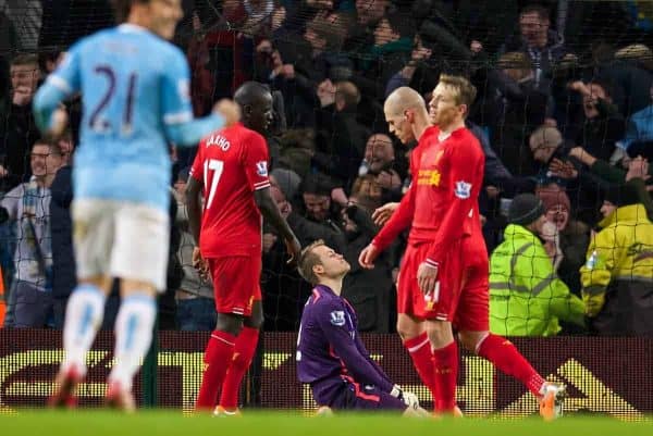 MANCHESTER, ENGLAND - Boxing Day Thursday, December 26, 2013: Liverpool's goalkeeper Simon Mignolet looks dejected as Manchester City score the second goal to make the score 2-1 during the Premiership match at the City of Manchester Stadium. (Pic by David Rawcliffe/Propaganda)