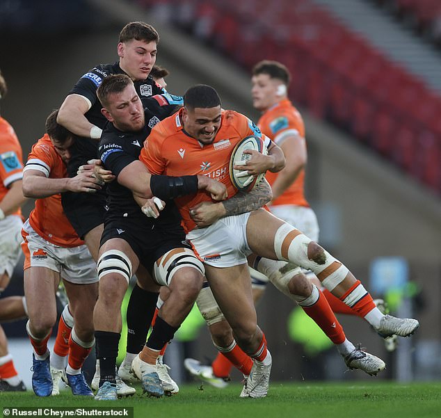 Glasgow's Tom Jordan watches Matt Fagerson get to grips with Tuipulotu in Glasgow's win