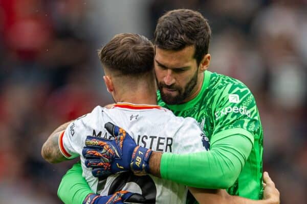 MANCHESTER, ENGLAND - Sunday, September 1, 2024: Liverpool's goalkeeper Alisson Becker (R) embraces Alexis Mac Allister during the FA Premier League match between Manchester United FC and Liverpool FC at Old Trafford. Liverpool won 3-0. (Photo by David Rawcliffe/Propaganda)