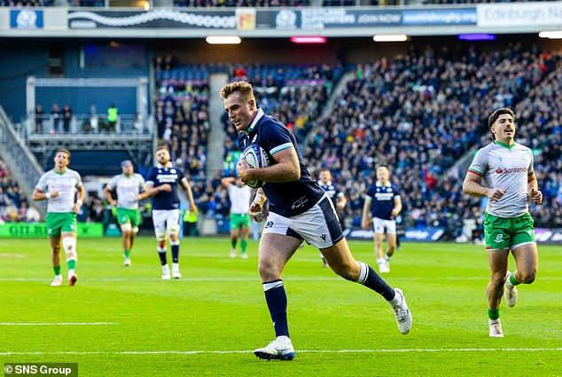 Scotland skipper for the day Stafford McDowall coasts in for an early try