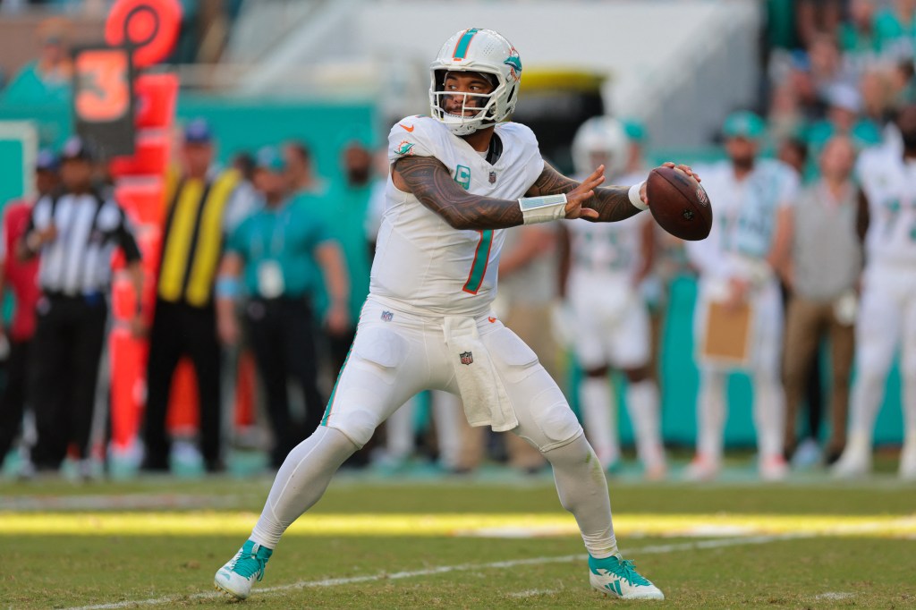 Dolphins quarterback Tua Tagovailoa (1) throws the football against the New York Jets