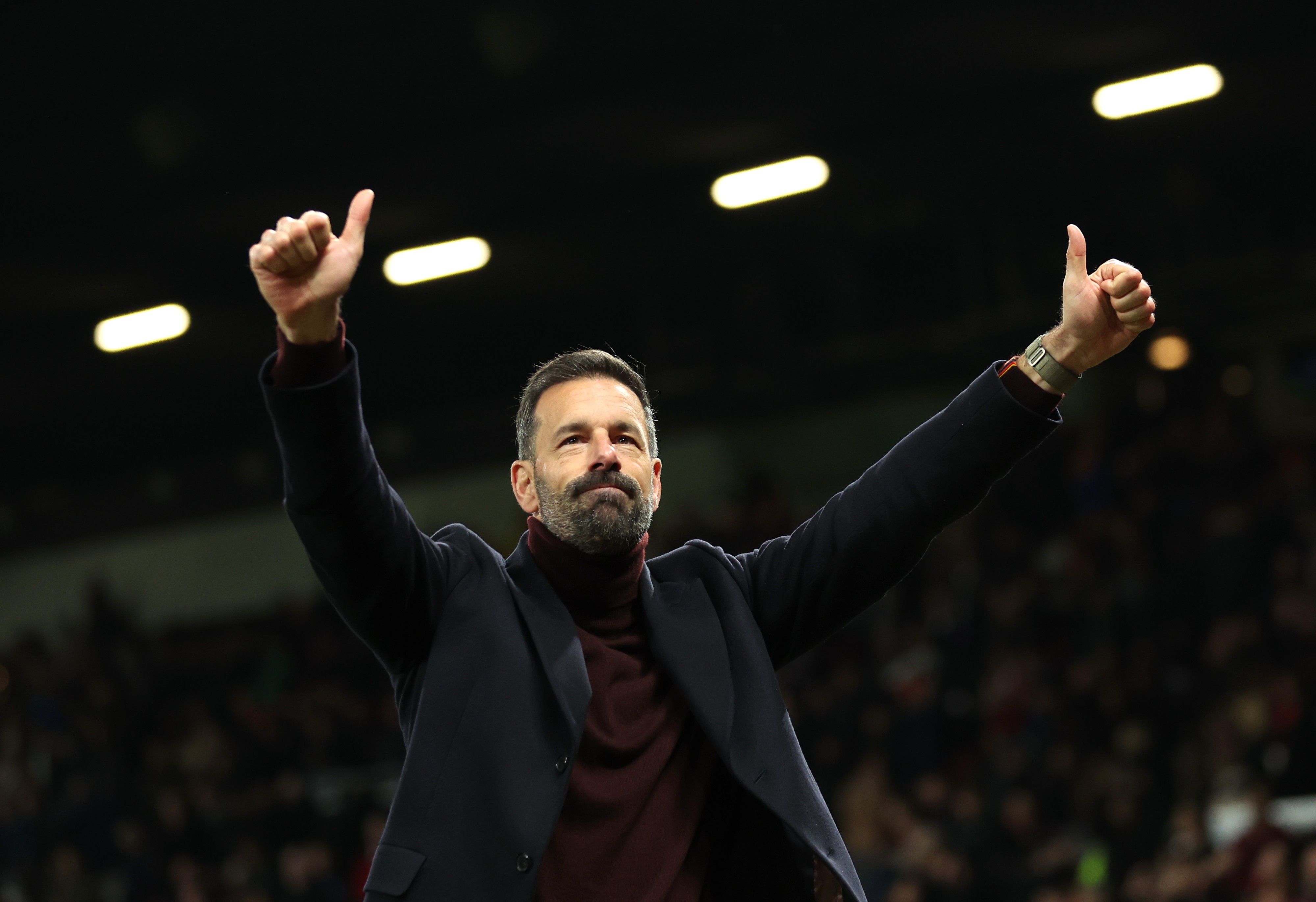 Ruud van Nistelrooy gestures to Manchester United fans