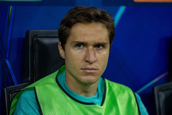 MILAN, ITALY - Tuesday, September 17, 2024: Liverpool's substitute Federico Chiesa on the bench before the UEFA Champions League game between AC Milan and Liverpool FC at the Stadio San Siro. Liverpool won 3-1. (Photo by David Rawcliffe/Propaganda)