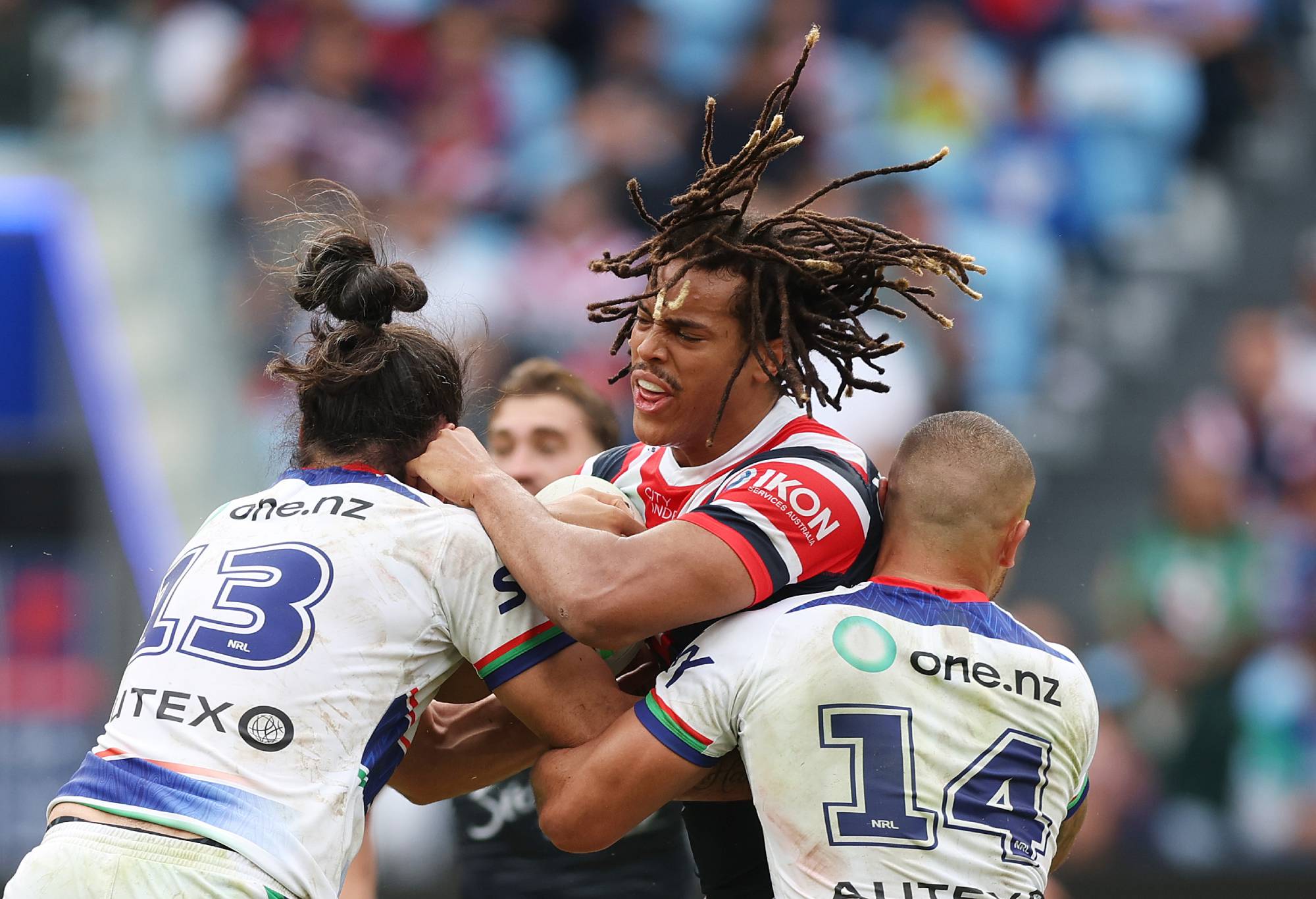 SYDNEY, AUSTRALIA - MAY 12: Dominic Young of the Roosters is tackled during the round 10 NRL match between Sydney Roosters and New Zealand Warriors at Allianz Stadium, on May 12, 2024, in Sydney, Australia. (Photo by Mark Metcalfe/Getty Images)