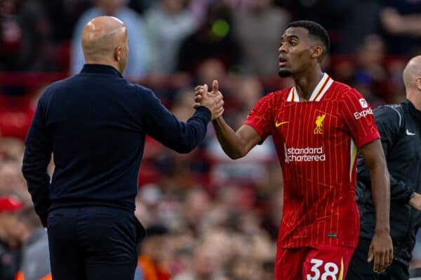 LIVERPOOL, ENGLAND - Sunday, August 25, 2024: Liverpool's Ryan Gravenberch embraces head coach Arne Slot as he is substituted during the FA Premier League match between Liverpool FC and Brentford FC at Anfield. Liverpool won 2-0. (Photo by David Rawcliffe/Propaganda)